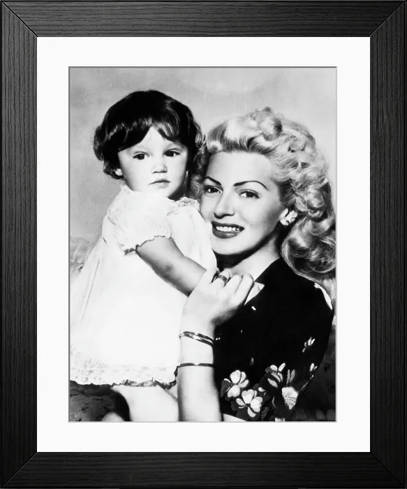 Framed Print : Lana Turner (right), and daughter Cheryl Crane, July 8, 1945. Courtesy: CSU Archives / Everett Collection