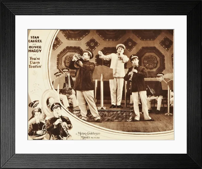 Framed Print : YOU'RE DARN TOOTIN, inset l-r: Oliver Hardy, Otto Lederer, Stan Laurel, bottom l-r: Stan Laurel, Oliver Hardy on lobbycard, 1928