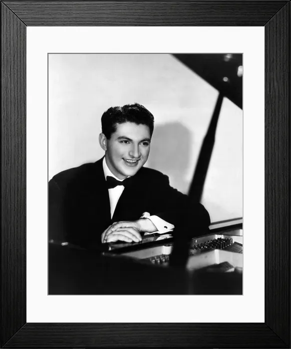 Framed Print : Liberace (1919-1987), American performer and classical pianist. Circa 1940s. Courtesy: CSU Archives / Everett Collection Framed Print : Liberace (1919-1987), American performer and classical pianist. Circa 1940s. Courtesy: CSU Archives / Everett Collection