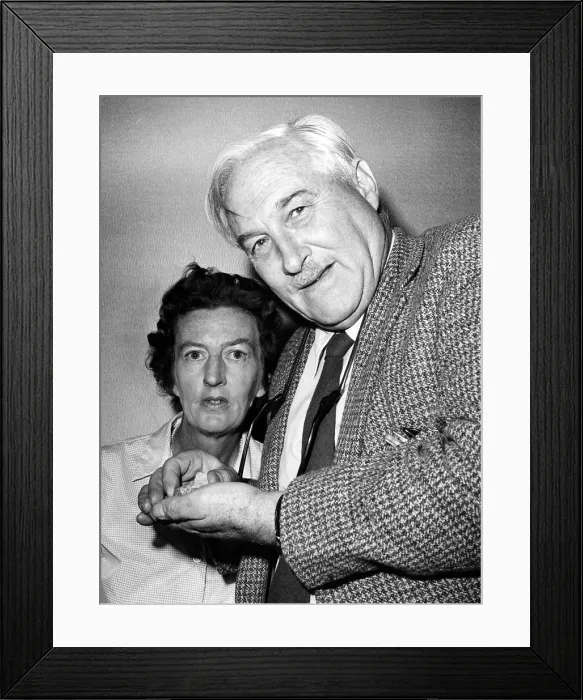 Framed Print : Louis Leakey (1903-1972), and Mary Leakey, archaeologists and anthropologists. Louis Leakey holds part of a palate of a 14 million year old human type creature. Circa 1960s