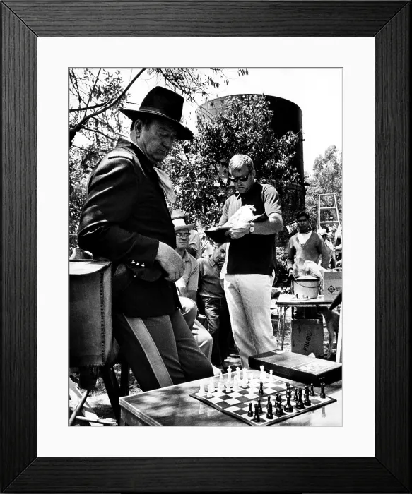 Framed Print : RIO LOBO, John Wayne (far left), on set, 1970.. Courtesy: CSU Archives / Everett Collection Framed Print : RIO LOBO, John Wayne (far left), on set, 1970.. Courtesy: CSU Archives / Everett Collection