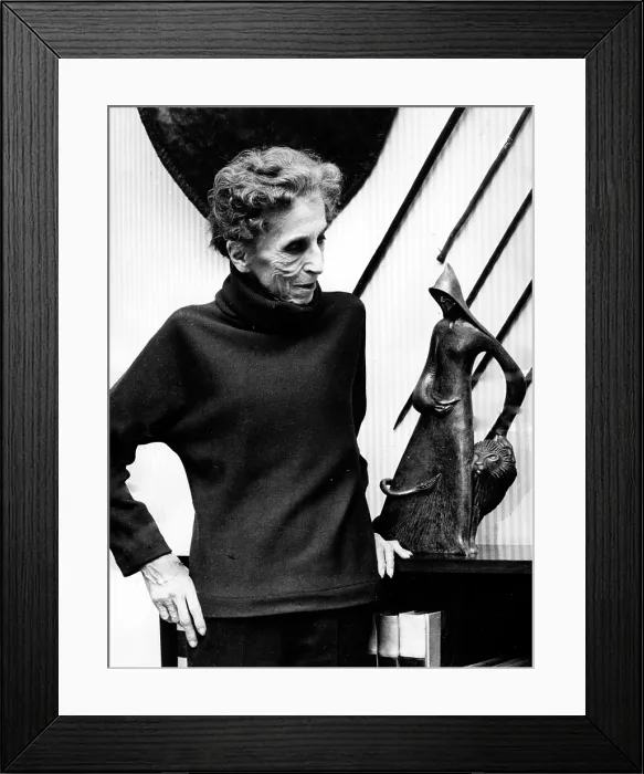 Framed Print : Karen Blixen, aka Isak Dinesen, beside a sculpture by Emile Norman, 1961. Courtesy: CSU Archives  /  Everett Collection