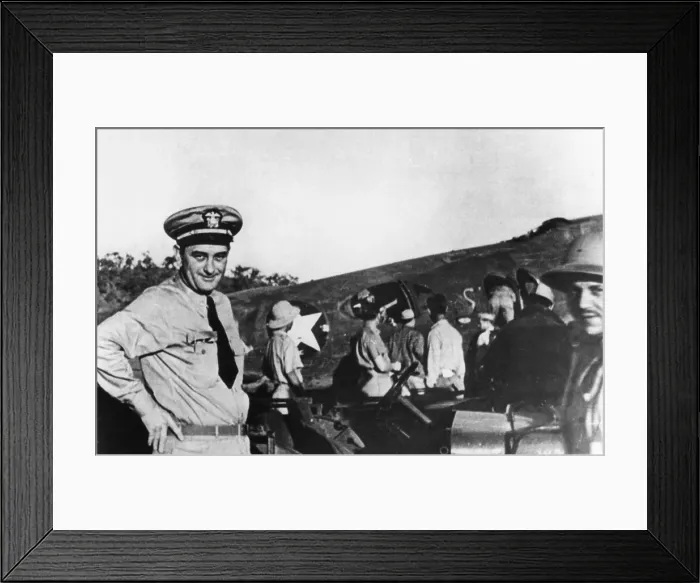 Framed Print : Lyndon Johnson as a commander during World War II in front of combat planes preparing to take off from Port Moresby, New Guinea for an air raid. ca 1940s Framed Print : Lyndon Johnson as a commander during World War II in front of combat planes preparing to take off from Port Moresby, New Guinea for an air raid. ca 1940s