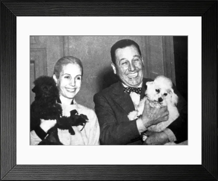 Framed Print : Eva and Juan Peron with their dogs, circa early 1950s. Courtesy: CSU Archives  /  Everett Collection