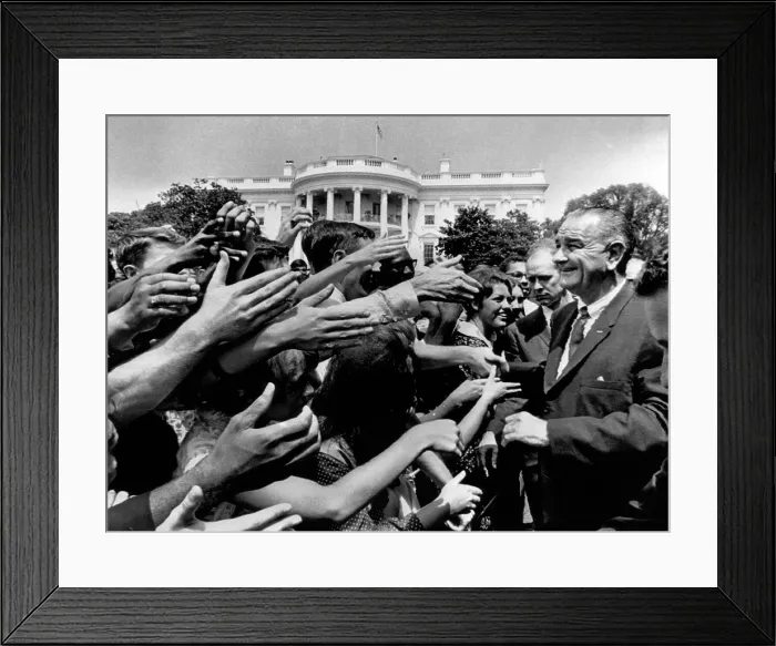 Framed Print : President Lyndon B. Johnson greets part of the 9, 000 young men and women working in Washington as summer interns in goverment jobs. August 4, 1965