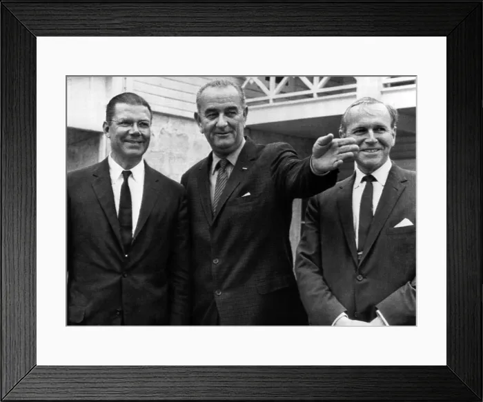 Framed Print : President Lyndon B. Johnson gestures as he talks to Defense Secretary Robert McNamara (l) and Deputy Secretary of Defense Roswell Gilpatric (r) during a meeting at the LBJ Ranch