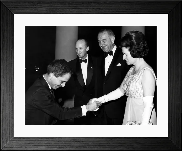 Framed Print : King Hussein of Jordan bows as he is greeted at the White House by Augier Biddle Duke, President Lyndon B.Johnson, and his wife Lady Bird Johnson. April 1964