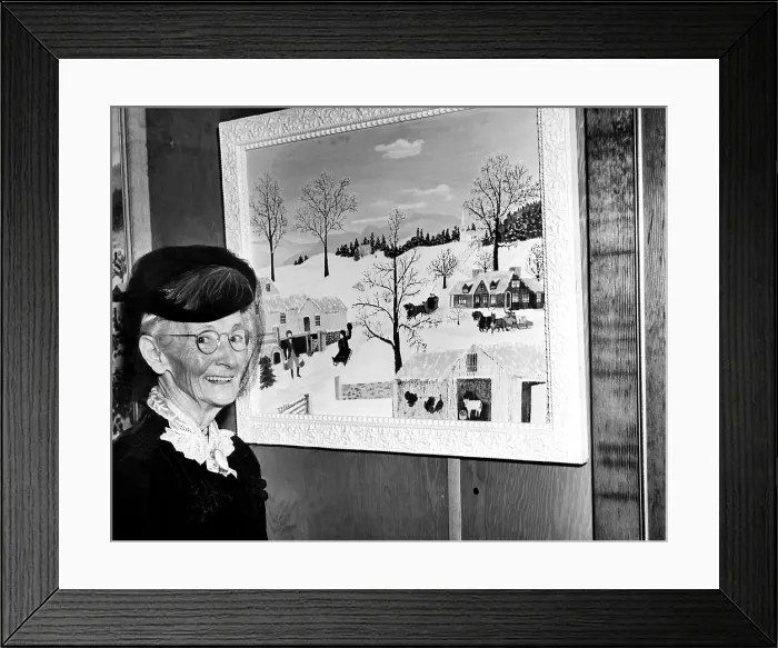 Framed Print : Anna Marie Robertson Moses (AKA Grandma Moses), in front of her painting at the 22nd annual Women's International Exposition of Arts and Industries ata Madison Square Garden