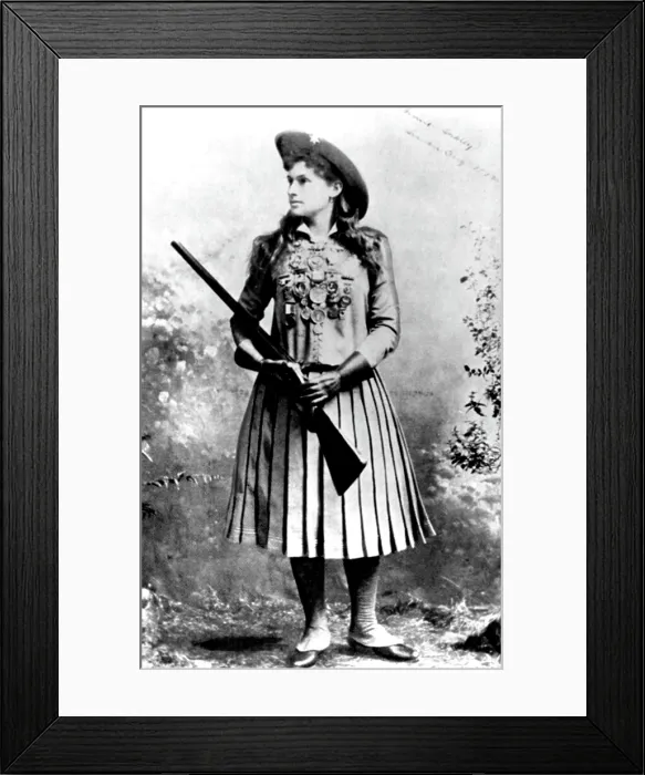 Framed Print : Annie Oakley, (aka: Phoebe Anne Oakley Moses), at age 32, in London, England, 1892. Credit: CSU Archives / Everett Collection Framed Print : Annie Oakley, (aka: Phoebe Anne Oakley Moses), at age 32, in London, England, 1892. Credit: CSU Archives / Everett Collection