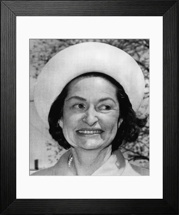 Framed Print : Lady Bird Johnson leaves St. Barnabus Episcopal Church following Easter services, April 14, 1968. Courtesy: CSU Archives / Everett Collection