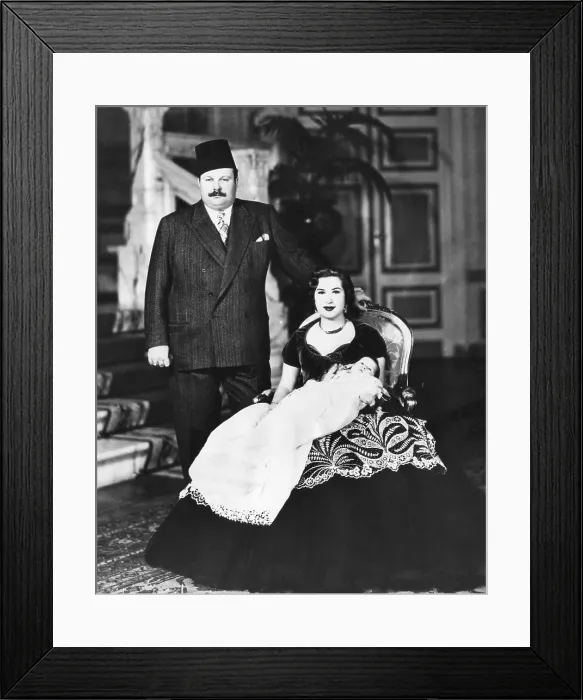 Framed Print : King Farouk of Egypt (1920-1965), Queen Narriman (holding Prince Ahmed Fouad), Cairo, Egypt, March 29, 1952.. Courtesy: CSU Archives  /  Everett Collection