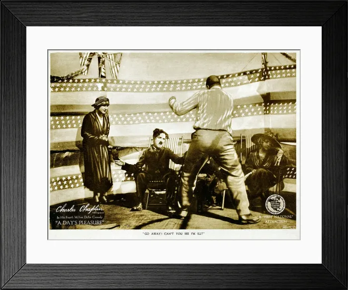 Framed Print : A DAY'S PLEASURE, from left: Edna Purviance, Charlie Chaplin, Tom Wilson on lobbycard, 1919