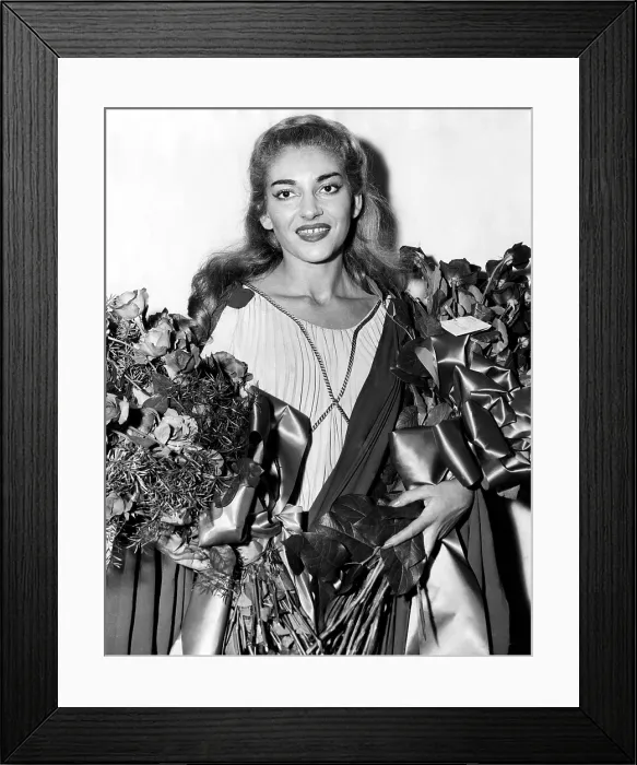 Framed Print : Maria Callas receives flowers after her performance in Norma at the Lyric Opera Company of Chicago, 1954. Courtesy: CSU Archives / Everett Collection