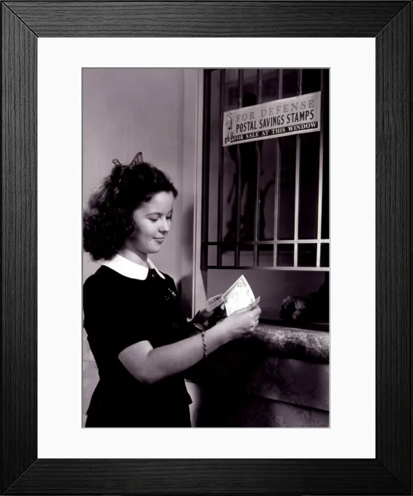Framed Print : Shirley Temple in promotional photo for Defense bonds and stamps, 1941. Courtesy: CSU Archives / Everett Collection Framed Print : Shirley Temple in promotional photo for Defense bonds and stamps, 1941. Courtesy: CSU Archives / Everett Collection