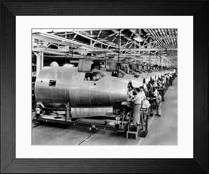 Framed Print : Men assemble aircraft at a Chrysler bomber plant, 1943. Courtesy: CSU Archives / Everett Collection