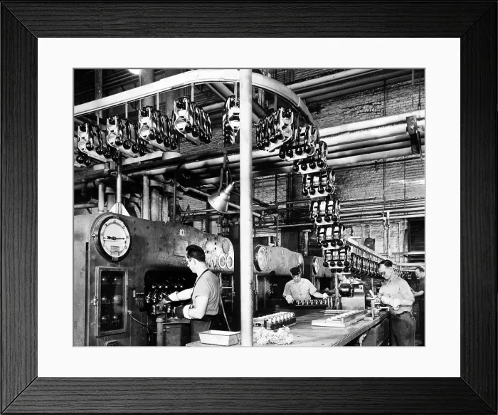 Framed Print : Men make phones for civilian use at Western Electric Company. They made thousands of phones for military use during the war, 1945. Courtesy: CSU Archives / Everett Collection