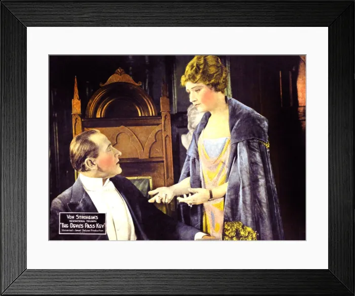 Framed Print : THE DEVIL'S PASS KEY, (aka THE DEVIL'S PASSKEY), l-r: Sam De Grasse, Una Trevelyn on lobbycard, 1920