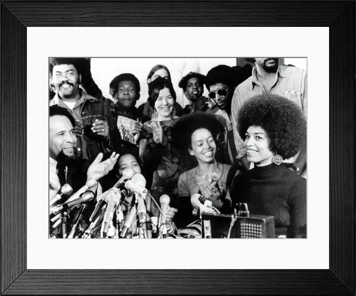 Framed Print : Angela Davis attended her first news conference 2 / 24 / 72 since being released on bail & told an audience of 200 newsmen & supporters that her release on bail was due to