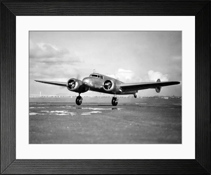 Framed Print : Amelia Earhart does a last minute checkup of fyling instruments before her take off from Alamdea, California to Honolulu, Hawaii, the first stop on her round the word flight