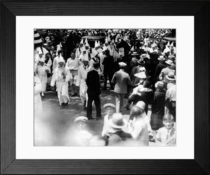 Framed Print : Ku Klux Klan parades in Queens borough of New York City. 1500 Klansmen, including 500 women, battered their way through 110 policemen into the Queen's Memorial Day Parade