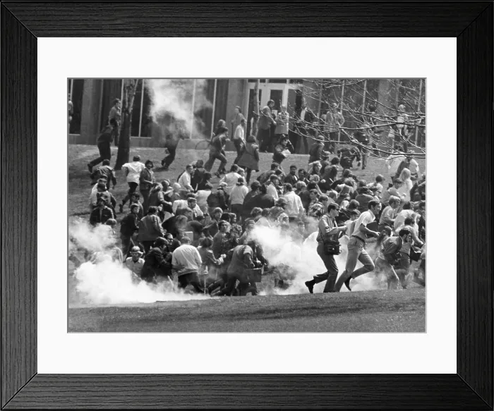 Framed Print : Tear gas disperses crowd on Kent State University Commons. Shortly afterward National Guardsmen fired 67 rounds in 13 seconds into a crowd of 500 Anti-Vietnam War protesters Framed Print : Tear gas disperses crowd on Kent State University Commons. Shortly afterward National Guardsmen fired 67 rounds in 13 seconds into a crowd of 500 Anti-Vietnam War protesters