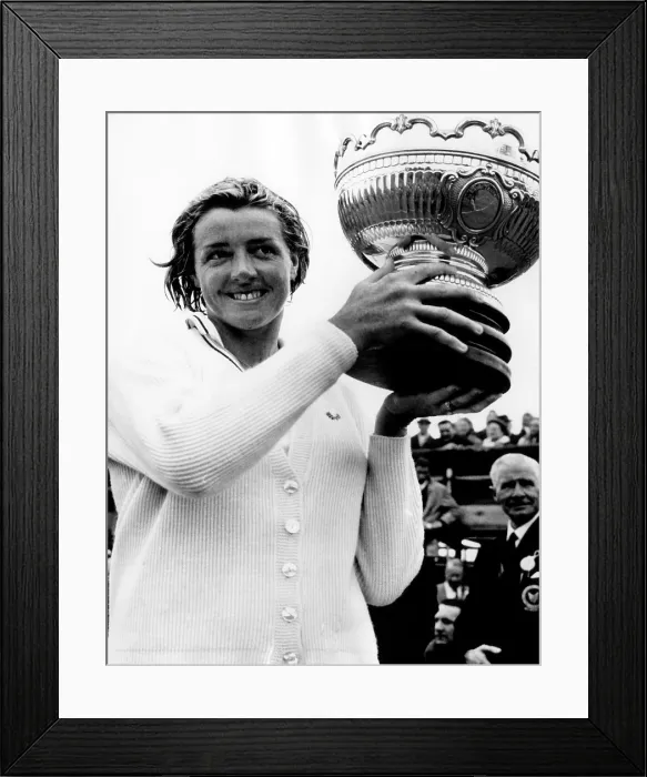 Framed Print : Australian Tennis player Margaret Court hold up British Hard Courts trophy after defeating Vinnie Shaw of Great Britian in women's singles. 5 / 3 / 69