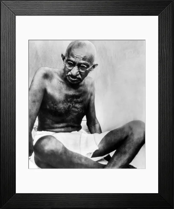 Framed Print : Mahatma Gandhi, 78, pauses during his walking tour. ca. October 1947. Courtesy: CSU Archives / Everett Collection Framed Print : Mahatma Gandhi, 78, pauses during his walking tour. ca. October 1947. Courtesy: CSU Archives / Everett Collection