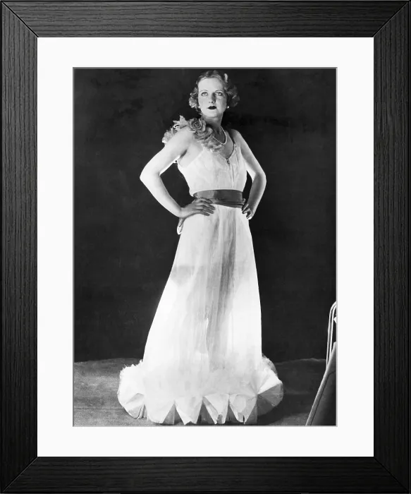 Framed Print : A woman models a gown made of spun glass