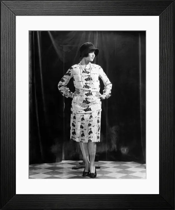 Framed Print : A woman models a silk crepe blouse and skirt, circa 1927 Framed Print : A woman models a silk crepe blouse and skirt, circa 1927