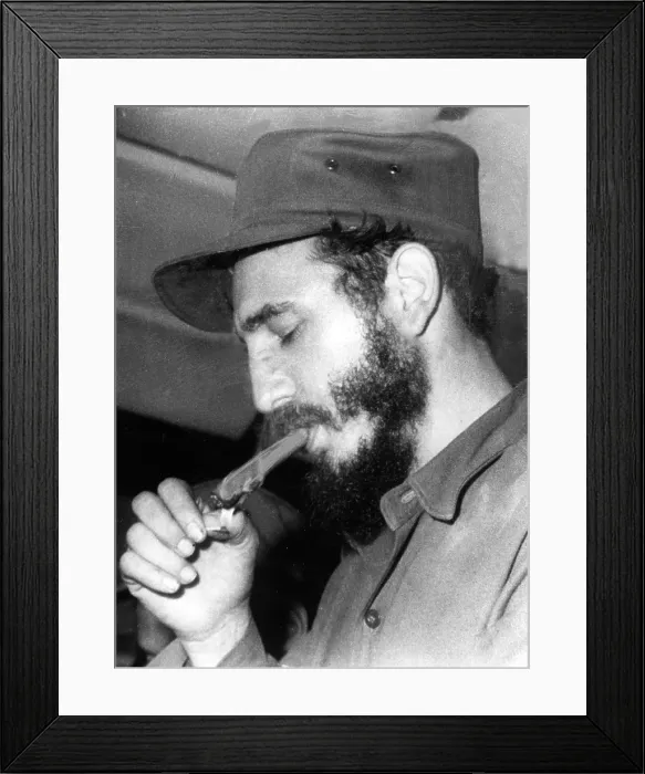 Framed Print : FIDEL CASTRO, lighting a cigar, 1967. Courtesy: CSU Archives / Everett Collection Framed Print : FIDEL CASTRO, lighting a cigar, 1967. Courtesy: CSU Archives / Everett Collection