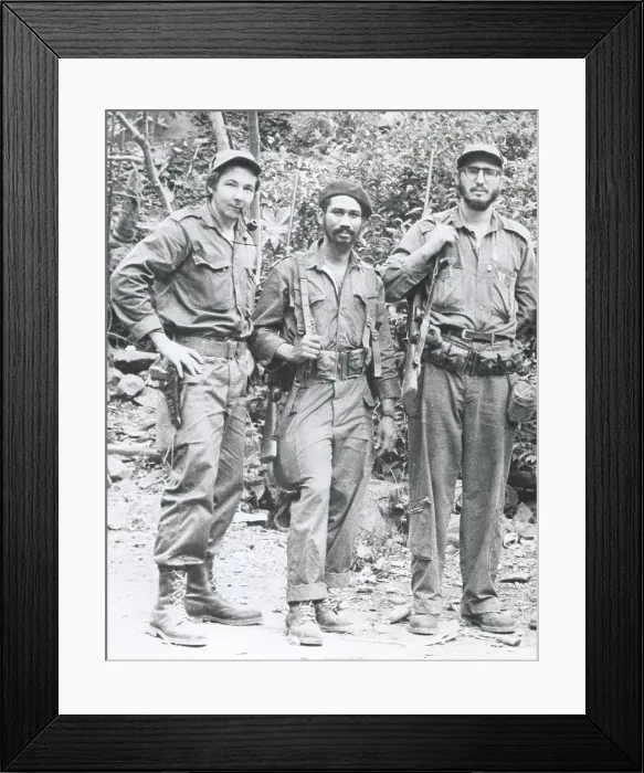 Framed Print : FIDEL CASTRO (far right), with his brother RAUL CASTRO (far left), and JUAN ALMEIDA (center), know as Cuban Rebels, c. 1959. Courtesy: CSU Archives  /  Everett Collection