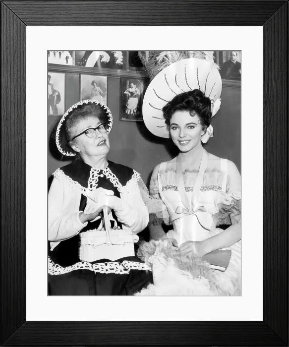 Framed Print : Evelyn Nesbit (left), visiting the movie set where Joan Collins (right) is portraying her in the film The Girl In The Red Velvet Swing, 1955 Framed Print : Evelyn Nesbit (left), visiting the movie set where Joan Collins (right) is portraying her in the film The Girl In The Red Velvet Swing, 1955