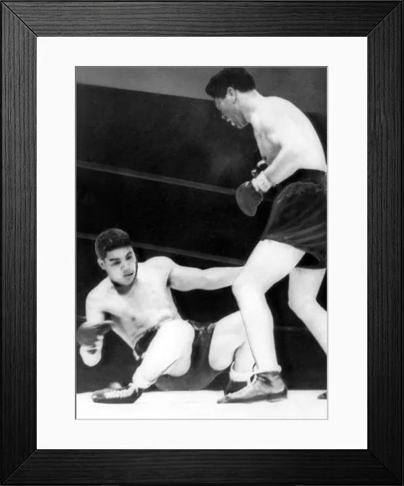 Framed Print : Max Schmeling defeats Joe Louis in 12 rounds, Yankee Stadium, 1936. Courtesy: CSU Archives / Everett Collection Framed Print : Max Schmeling defeats Joe Louis in 12 rounds, Yankee Stadium, 1936. Courtesy: CSU Archives / Everett Collection