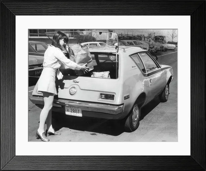 Framed Print : American Motors The Gremlin, car owner placing grocery bags inside the rear lift-gate, April 9, 1970. Courtesy: CSU Archives / Everett Collection