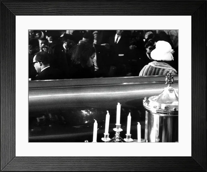 Framed Print : A Last Look: Mrs. Betty Little Shabazz, widow of Malcolm X, walks away from coffin after viewing the body of her husband during funeral services February 27th, 1965