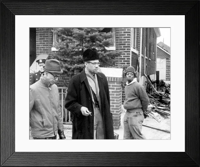 Framed Print : Malcolm X (center, 1925-1965), talks to a reporter after a fire bomb was thrown in his house. February 14, 1965. CSU Archives Courtesy Everett Collection Framed Print : Malcolm X (center, 1925-1965), talks to a reporter after a fire bomb was thrown in his house. February 14, 1965. CSU Archives Courtesy Everett Collection