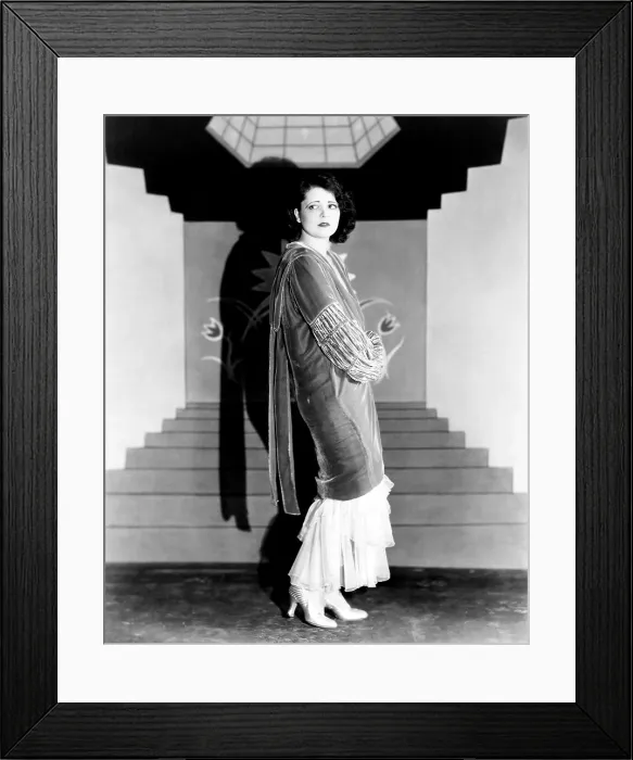 Framed Print : Clara Bow, modeling an evening wrap of chiffon velvet, over a chiffon evening gown, ca. 1927 Framed Print : Clara Bow, modeling an evening wrap of chiffon velvet, over a chiffon evening gown, ca. 1927