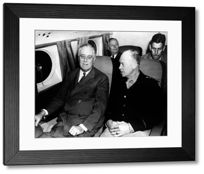 Framed Print : President Franklin D. Roosevelt, and General Dwight D. Eisenhower, flying to Sicily following conferences in Cairo, December, 15, 1943. Courtesy: CSU Archives / Everett Collection Framed Print : President Franklin D. Roosevelt, and General Dwight D. Eisenhower, flying to Sicily following conferences in Cairo, December, 15, 1943. Courtesy: CSU Archives / Everett Collection