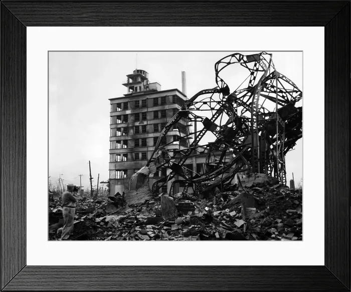 Framed Print : The blasted Chuguko Press building along Hiroshima's main street shortly after the blast. (far left)