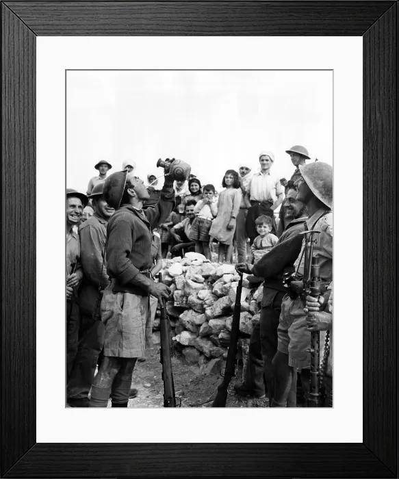 Framed Print : Israeli troops drinking water in a traditional manner in which the spout never touches their lips. November 1948.Courtesy: CSU Archives / Everett Collection