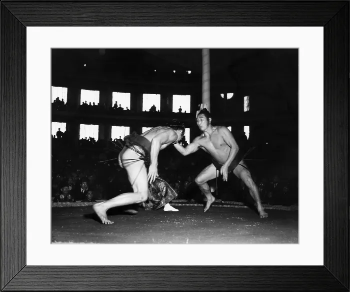 Framed Print : Omoumi defeats his opponent, Onomori, in a sumo wrestling match. ca 1945. Courtesy: CSU Archives / Everett Collection