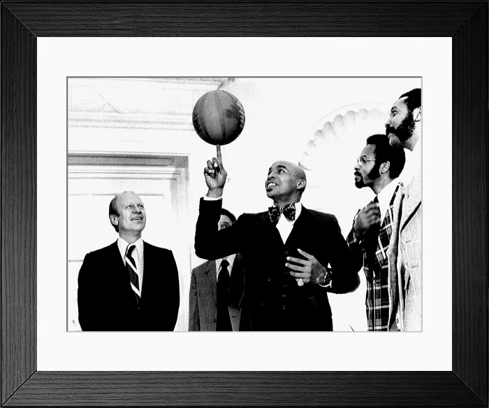 Framed Print : President Gerald Ford, enjoys a performance by Curly Neal and The Harlem Globetrotters, when they visited The White House, December 6, 1974