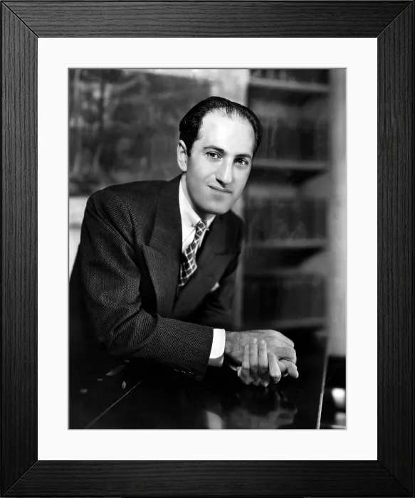 Framed Print : Composer George Gershwin at the piano in his New York apartment. ca. 1930s. Courtesy: CSU Archives / Everett Collection