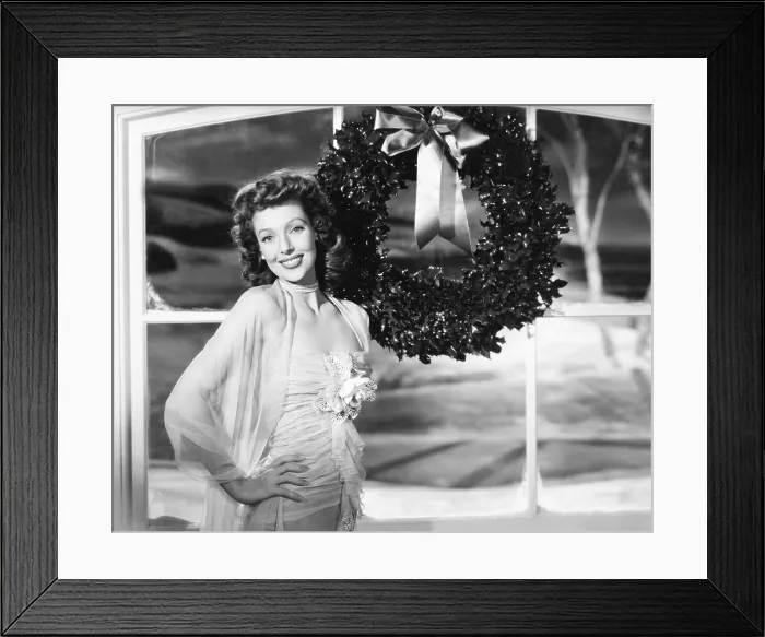 Framed Print : Loretta Young in Universal studio portrait greets the holiday season, 1943