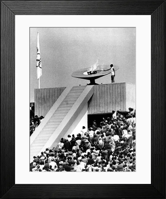 Framed Print : The Olympic cauldron is lit by Mexican hurdler Enriqueta Basilio during the opening ceremony of the 1968 Summer Olympics in Mexico City, Mexico, October 12, 1968 Framed Print : The Olympic cauldron is lit by Mexican hurdler Enriqueta Basilio during the opening ceremony of the 1968 Summer Olympics in Mexico City, Mexico, October 12, 1968