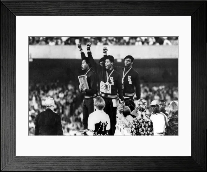 Framed Print : 1968 Olympics, 4x100 Men's Relay Team gives Black Power salute upon receiving Gold Medals. (L-R) Lee Evans, Ronald Freeman, Larry James, Vincent Matthews