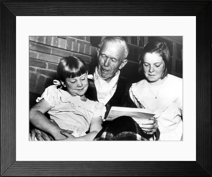 Framed Print : General George C. Marshall (center), reading telegrams to his granddaughters Ellene (left), and Katherine (far right), North Carolina, October 31, 1953