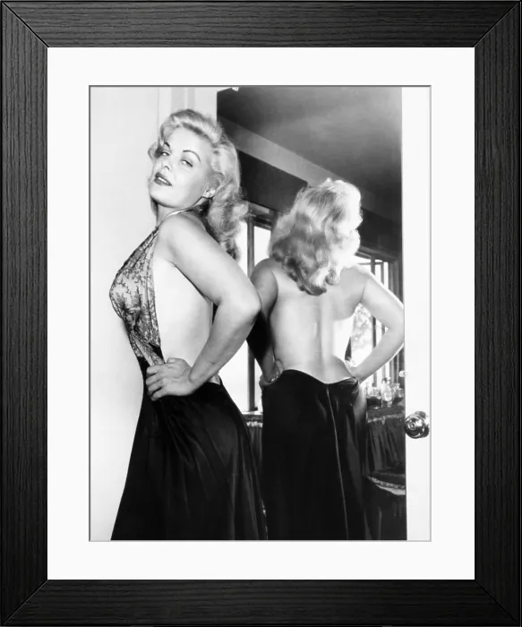 Framed Print : Cleo Moore at home posing for photographers, 1955