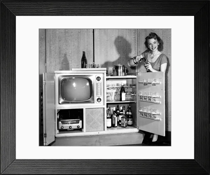 Framed Print : Admiral Television set and entertainment center, complete with record player and fully stocked bar. Model not included. Circa 1951.. Courtesy: CSU Archives  /  Everett Collection