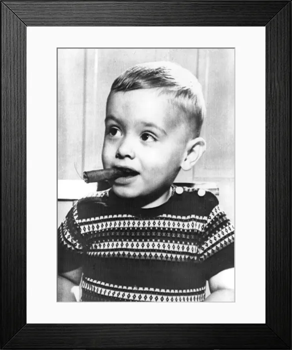 Framed Print : Raymond Judd Jr, 29 months old, who smokes two cigarettes a day and an occasional cigar, Louisville, KY 6 / 1958. Courtesy: CSU Archives / Everett Collection Framed Print : Raymond Judd Jr, 29 months old, who smokes two cigarettes a day and an occasional cigar, Louisville, KY 6 / 1958. Courtesy: CSU Archives / Everett Collection